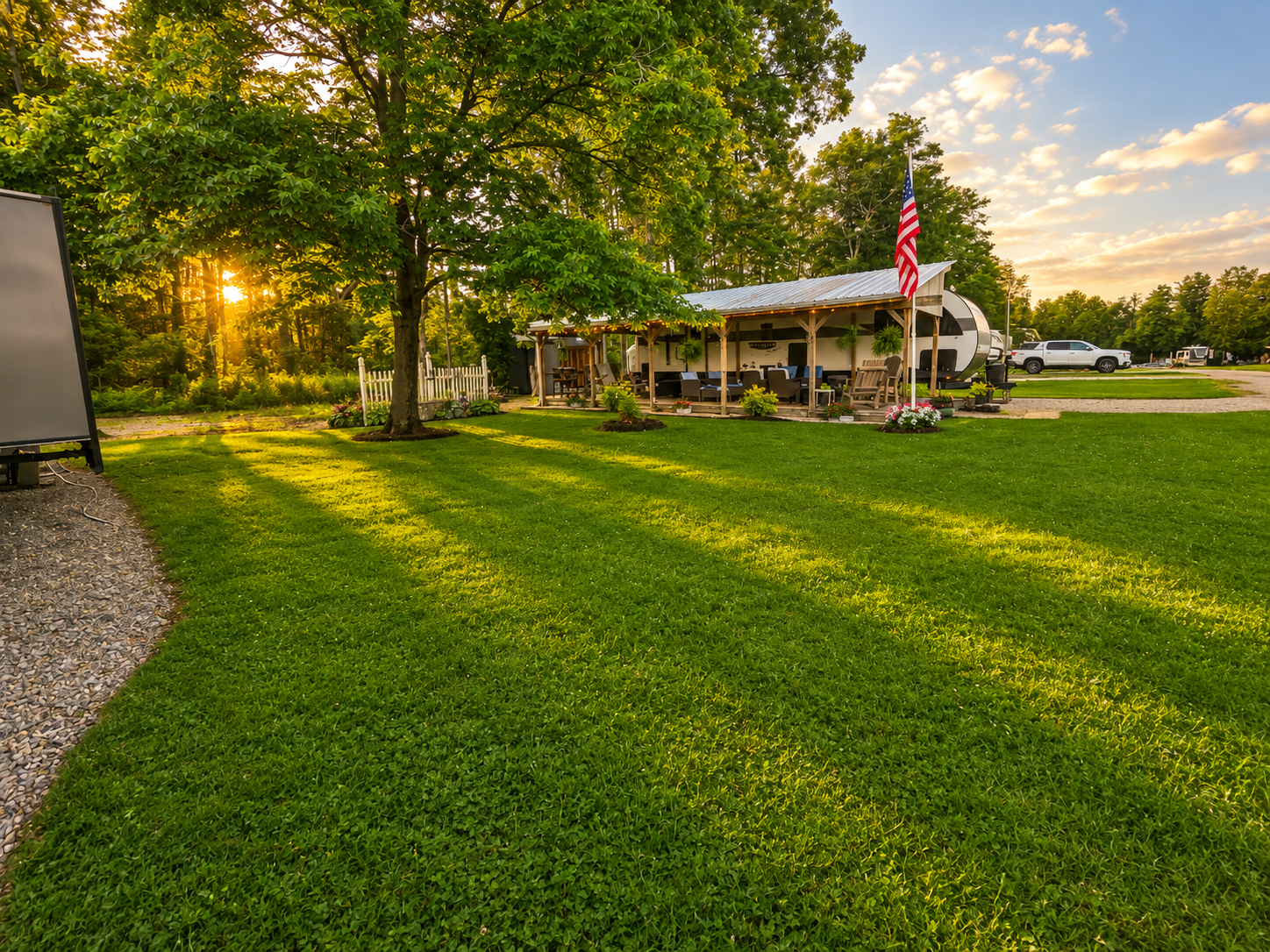 Established seasonal site with a deck, landscaping, and personal touches